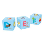 Alphabet cubes stacked showing letter patterns clearly