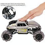 Forward diagonal shot showing headlights area and thick tyres