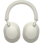 Silver WH-1000XM5 shown flat showing earcups and headband finish