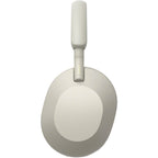 Slight tilt of silver WH-1000XM5 showing earcup and headset frame