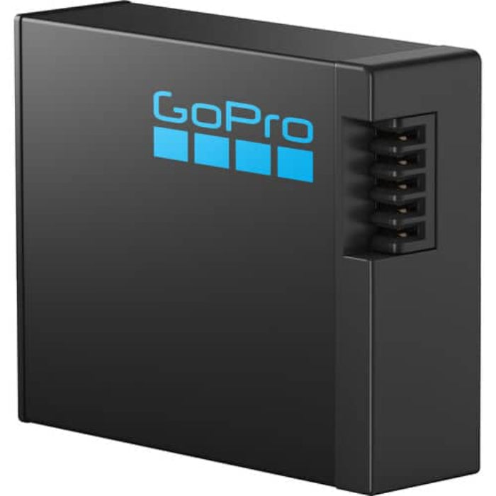 GoPro HERO13 Black with Enduro battery on a table beside camera accessories.