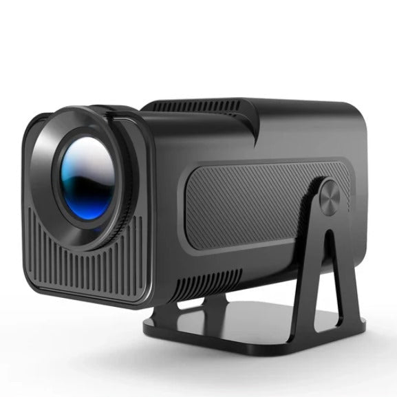 Magcubic HY320 NTV projector with remote control and power adapter on desk