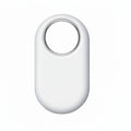 Close‑up of Samsung Galaxy SmartTag2 White showing pill‑shaped design with large central keyring hole and Samsung logo.​

