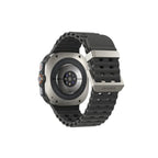 Close‑up of Galaxy Watch Ultra Titanium Silver showing titanium case, Sapphire Crystal and Quick Button detail