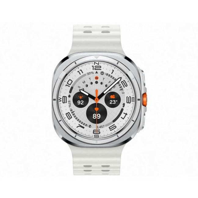 Samsung Galaxy Watch Ultra 47mm Titanium White on wireless charging puck with green charging animation on display.