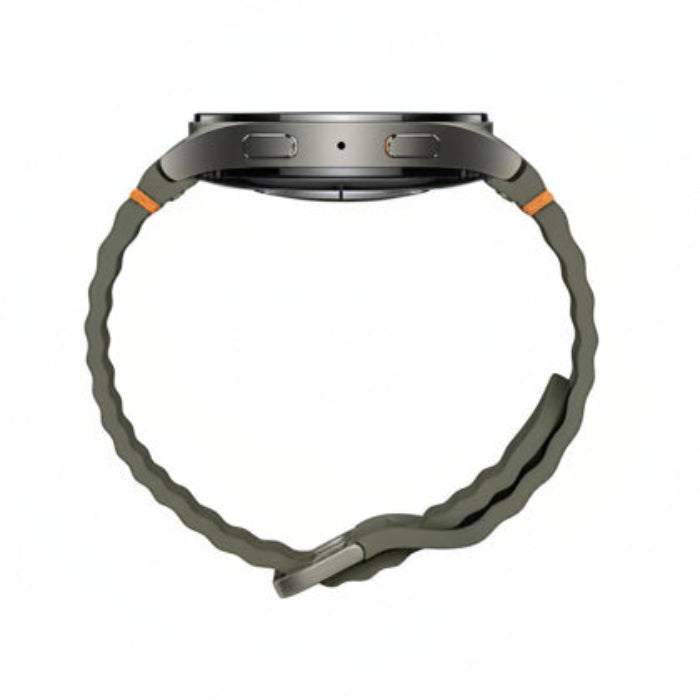 Samsung Galaxy Watch 7 44mm Green beside smartphone running Galaxy Wearable app

