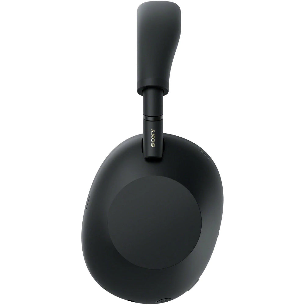 Sony WH-1000XM6 Premium Noise Cancelling Headphones – Black connected with a 3.5 mm audio cable for wired listening.